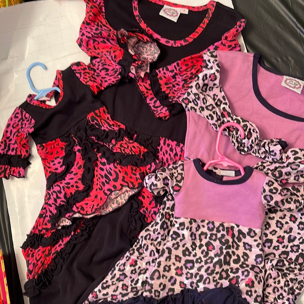 Two girl dresses with matching 18in dresses. Not for sale at this time.